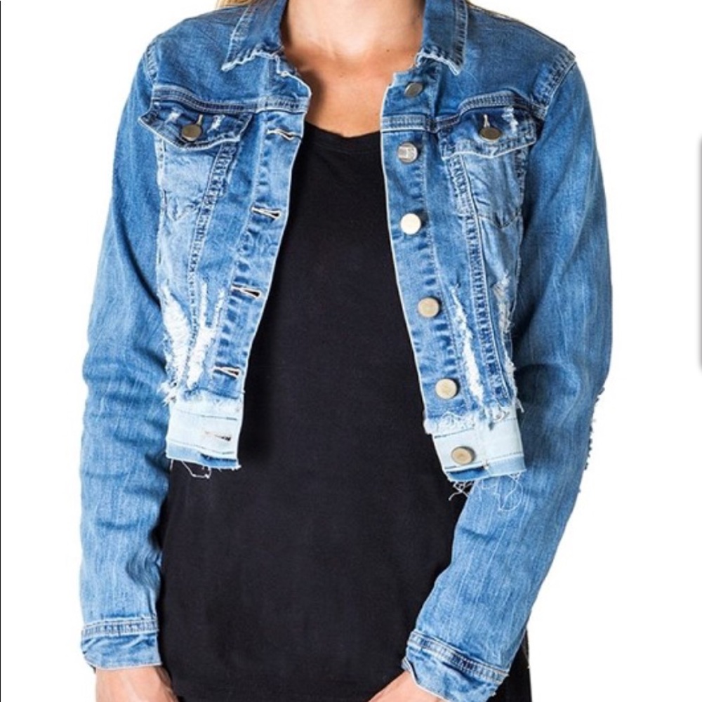 Distressed denim jacket